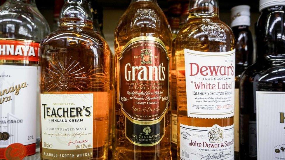 Whiskies on display in supermarket