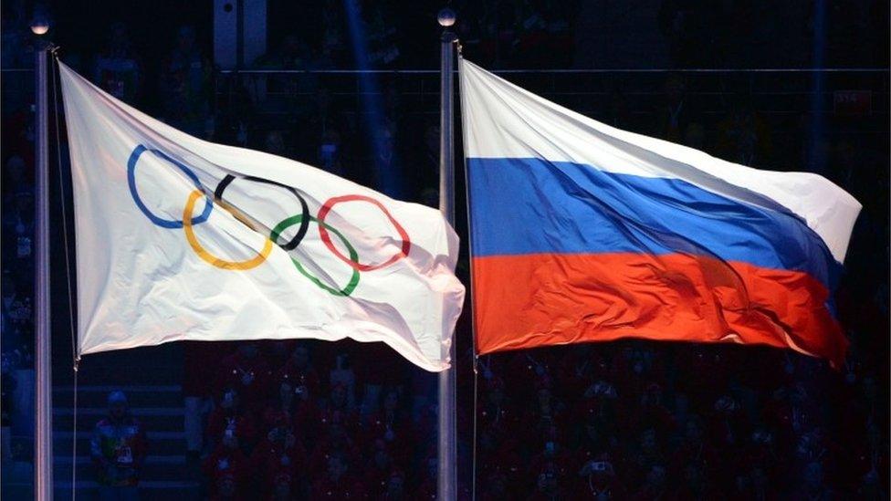 Olympic and Russian flags