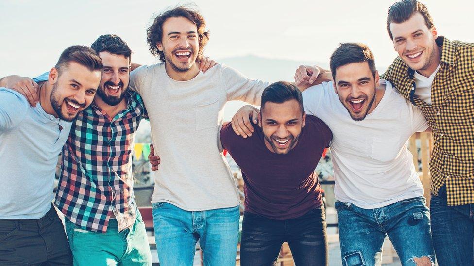 A group of young men on holiday