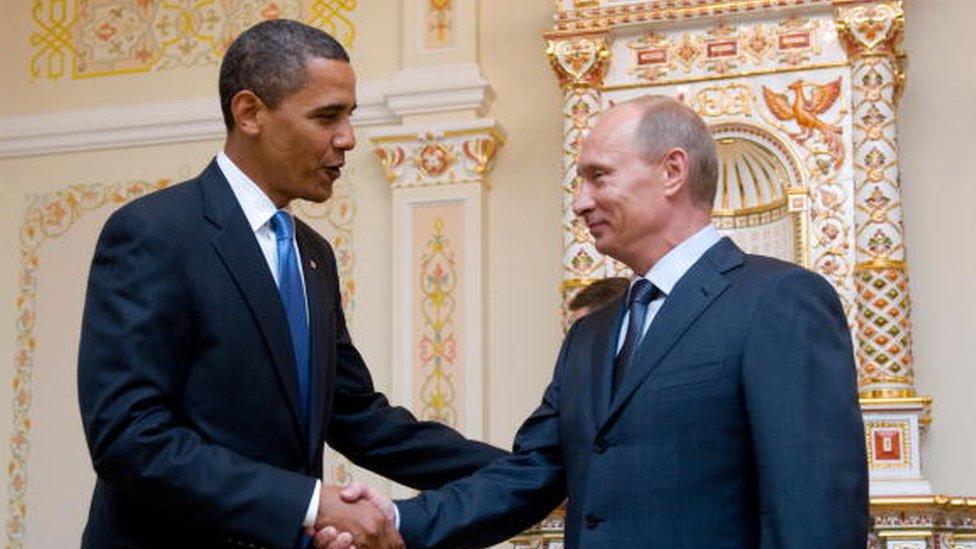 US President Barack Obama and Russian Prime Minister Vladimir Putin shake hands during a meeting in Moscow