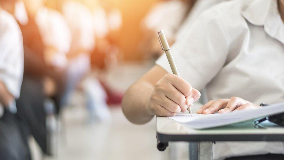 A school pupil sitting an exam