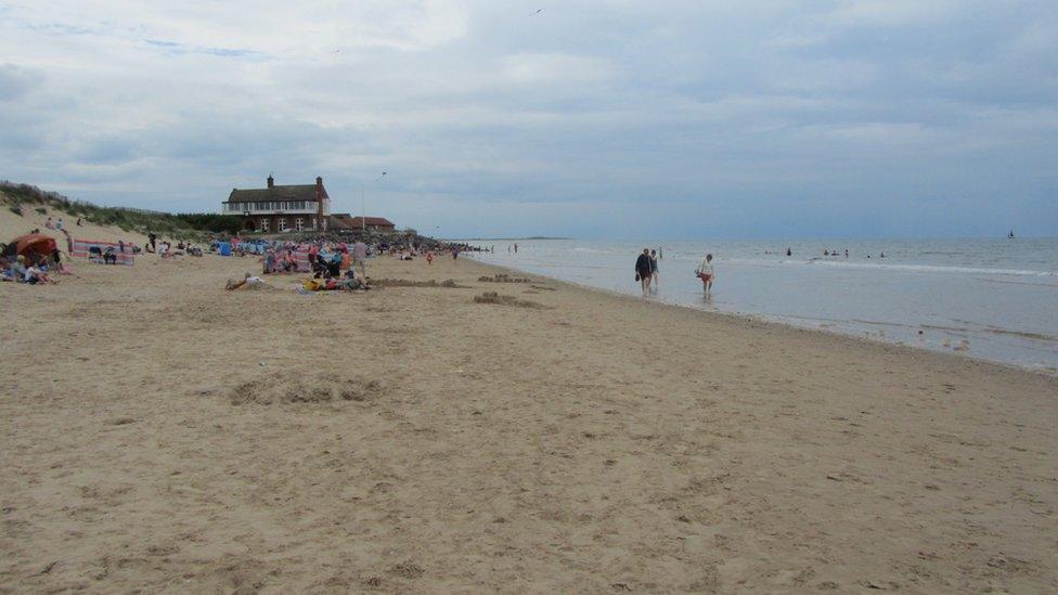 Brancaster beach and the clubhouse at the Royal West Norfolk Golf Club