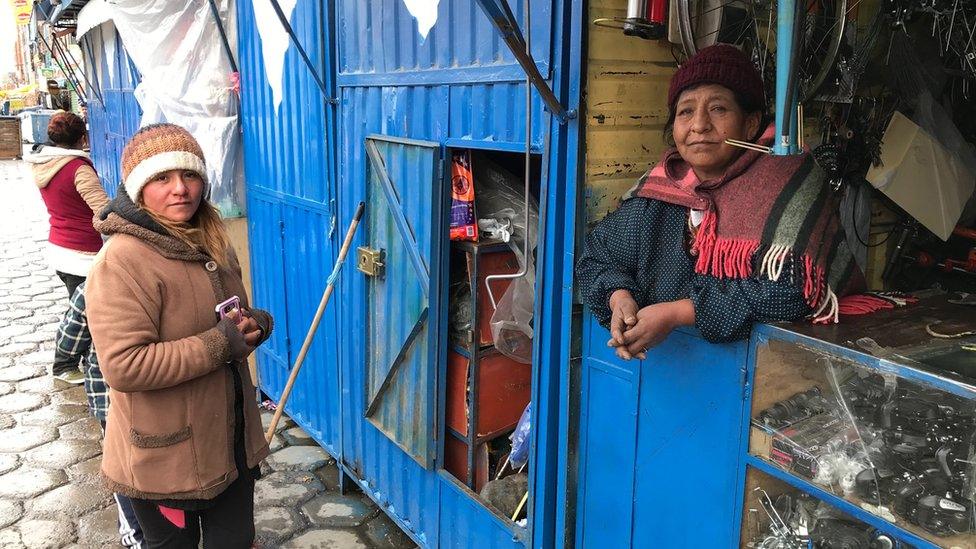 Dania is pictured at the market in El Alto