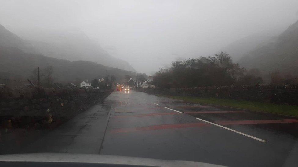 Flooding on a road at Nant Peris