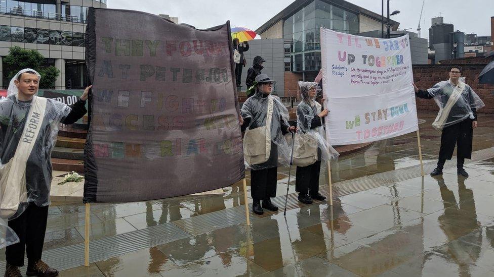 Protesters campaigning over the lack of disabled access to the Peterloo Memorial