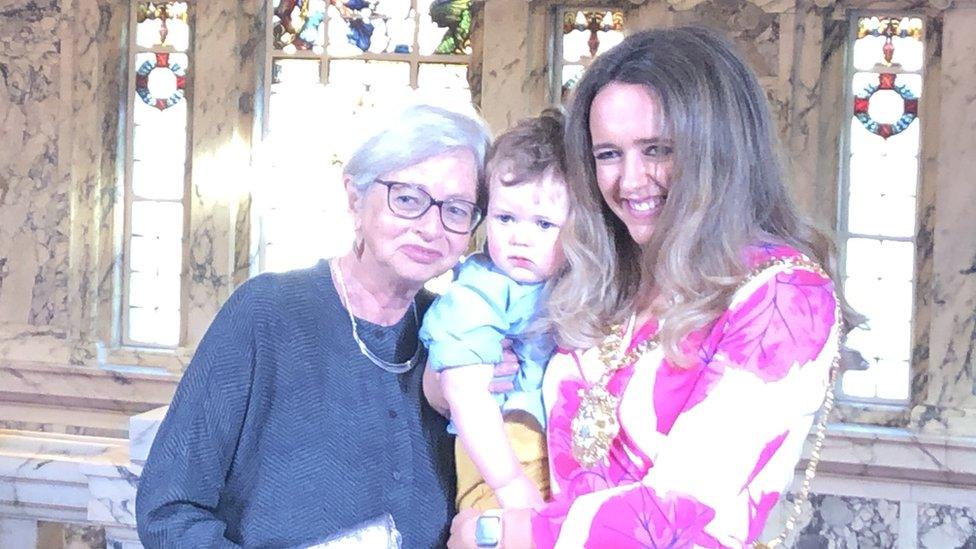 Kate Nicholl, mother Helen and son Kian at City Hall for her installation ceremony