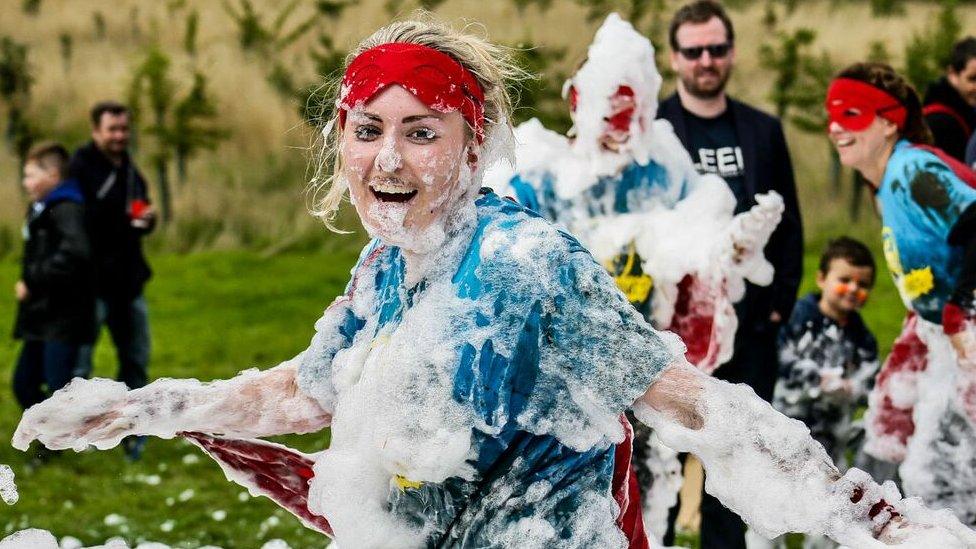 Woman covered in foam