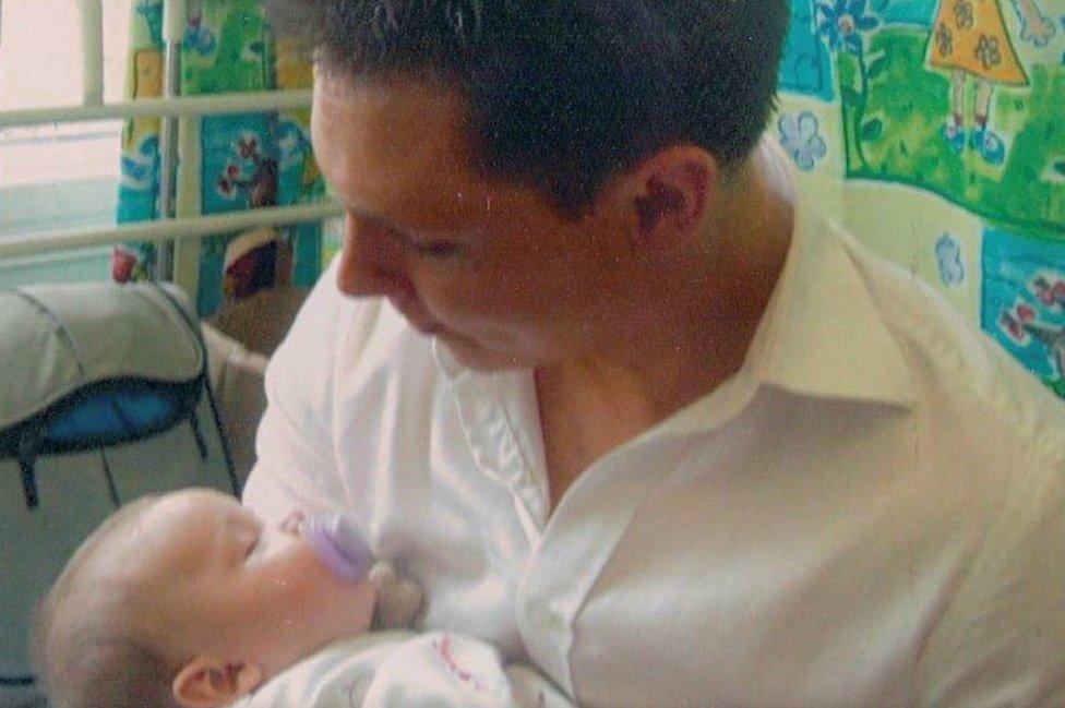 Ben Butler with his newborn daughter Ellie