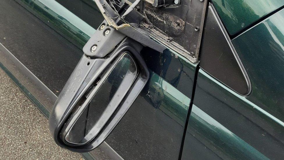 Broken wing mirror