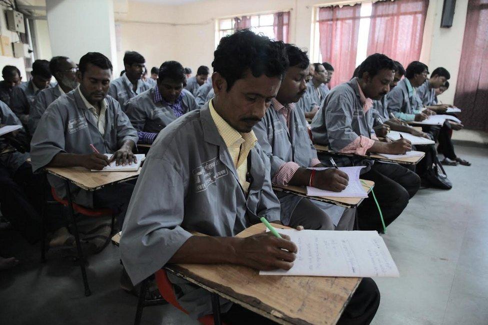 Unqualified medics receiving training in a classroom