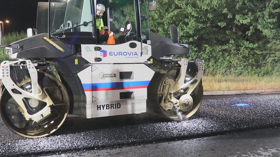 A road being resurfaced as part of the graphene trial