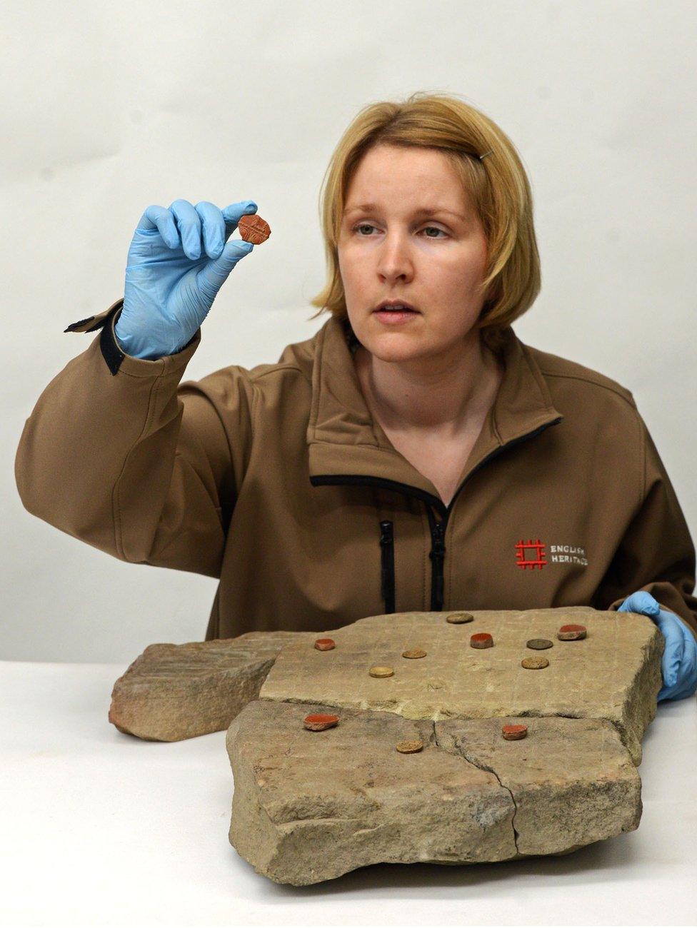 Frances McIntosh, with a Roman board game