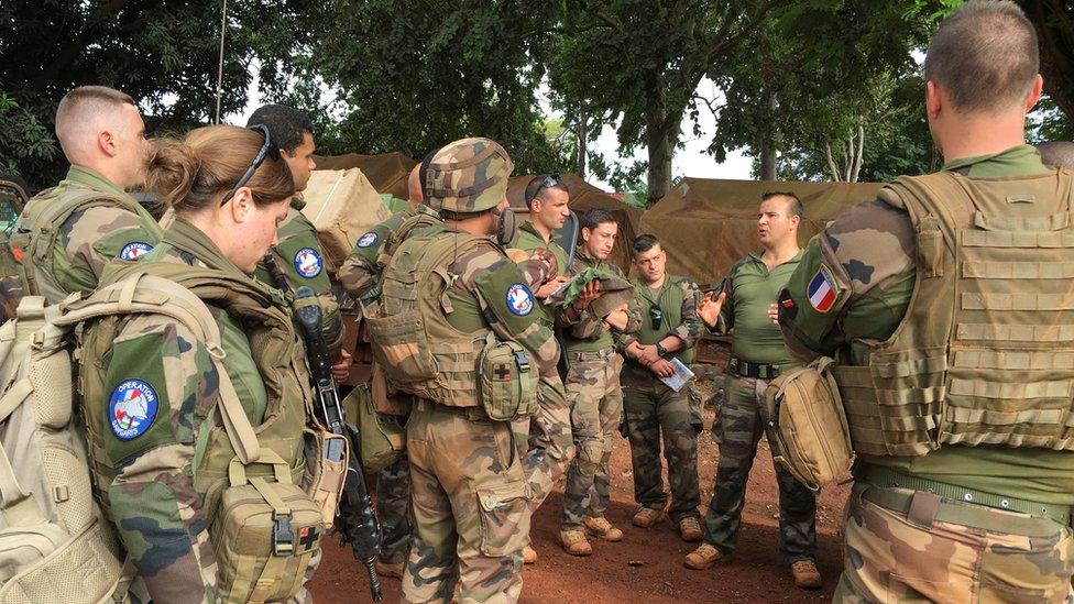 Team briefing for French troops before getting out on patrol in Bangui