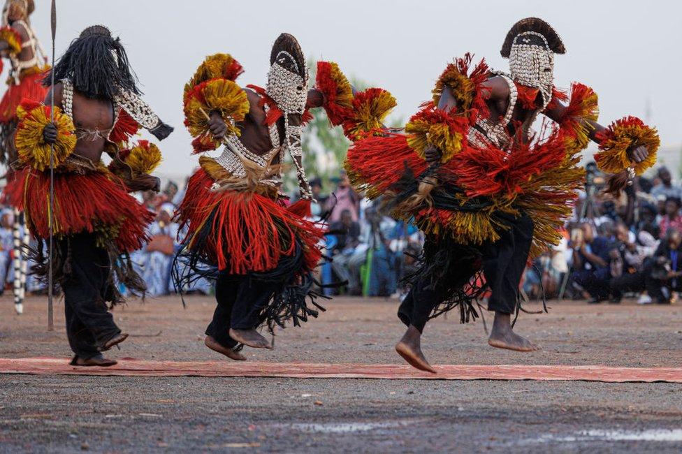 Men from the Dogon ethnic group dance during the Ogobagna Masked Dance ceremony in Bamako.