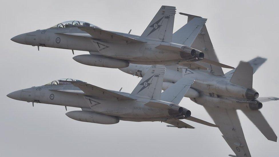 Royal Australian Air Force F-18 Hornets perform during the Australian International Airshow at the Avalon Airfield near Lara southwest of Melbourne on February 24, 2015