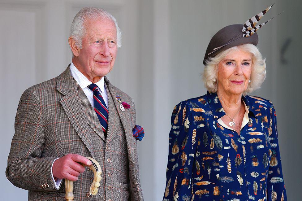 BRAEMAR, SCOTLAND - SEPTEMBER 07: (EMBARGOED FOR PUBLICATION IN UK NEWSPAPERS UNTIL 24 HOURS AFTER CREATE DATE AND TIME) King Charles III (wearing a Royal Marines tie) and Queen Camilla attend The Braemar Gathering 2024.