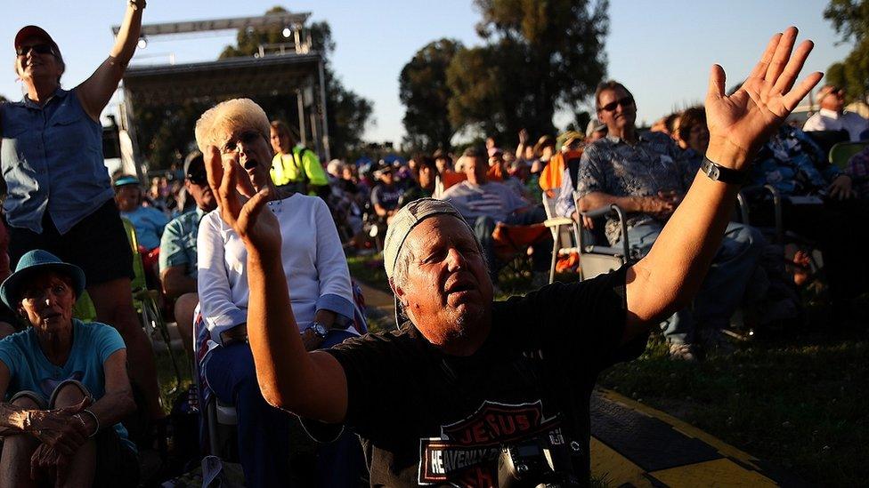 Attendees sing during Franklin Graham's "Decision America" California tour at the Stanislaus County Fairgrounds on May 29, 2018 in Turlock, California.