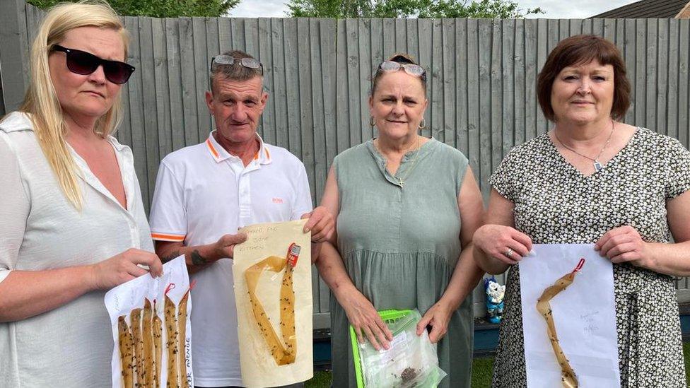 Some of the residents in Leicester Forest East who say they've been plagued with flies since 2018 (L to R: Kerry Harrison, Leon Foggin, Carla Armann, Debbie Hes)