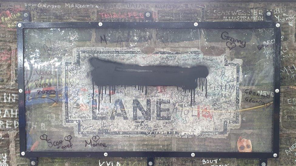 Defaced Penny Lane sign