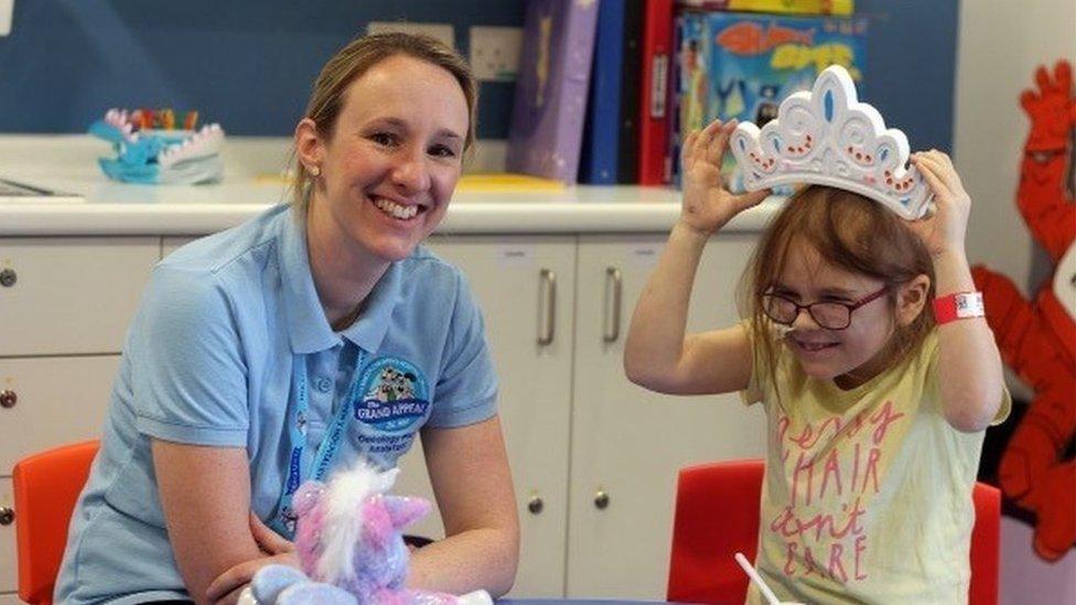 Kara in recovery with play specialist at Starlight Ward, Bristol Children’s Hospital