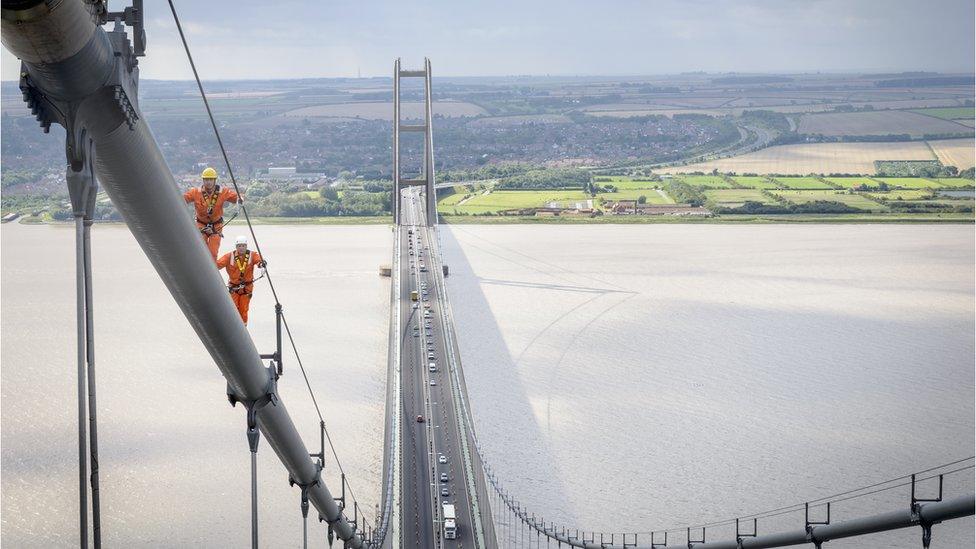 Workers on the bridge