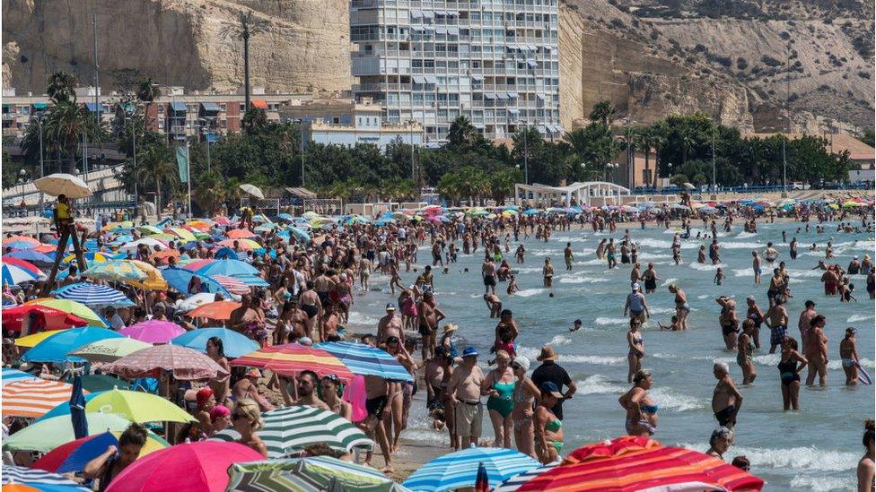 Tourists on a beach