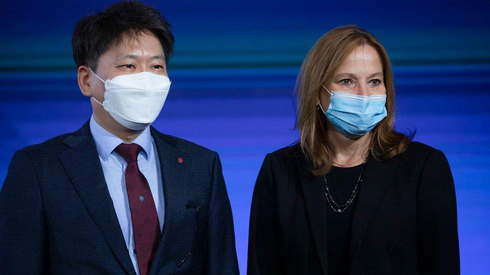 General Motors CEO Mary Barra poses for a photo with Dong Myung Kim, LG Energy Solution Head of Advanced Automotive Battery Division at an event.