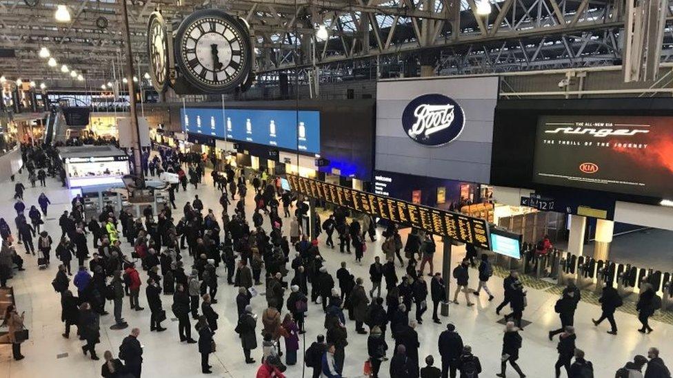 Commuters inside Waterloo Railway Station, London