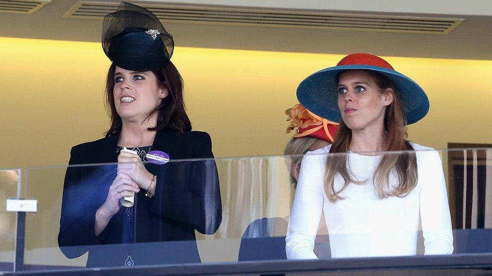 Princess Eugenie and Princess Beatrice watch the Queen's horse in the final race