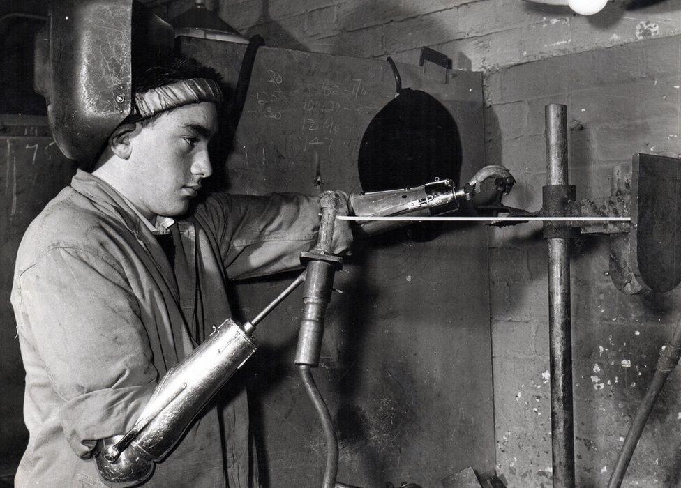 A double arm amputee doing gas welding