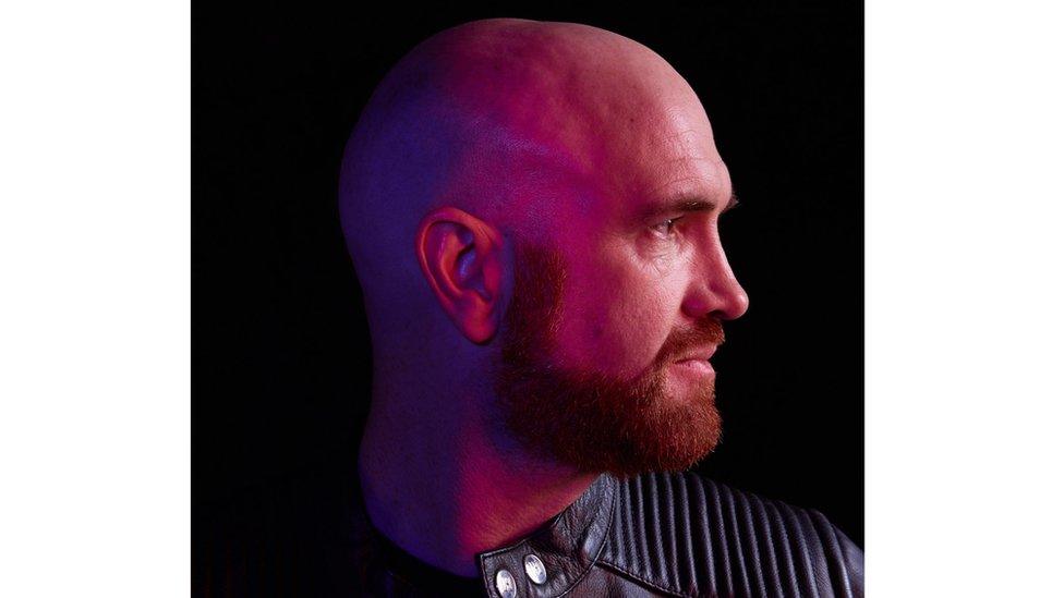 A side profile of Mark Sheehan