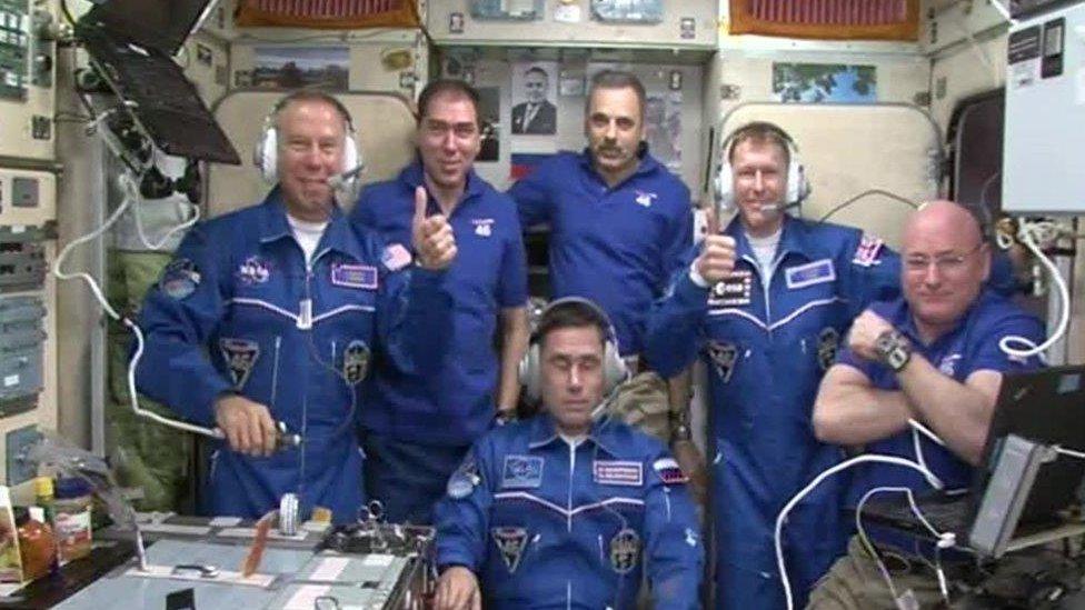 Screen grab from footage issued by European Space Agency of British astronaut Tim Peake with fellow crew members on the International Space Station.