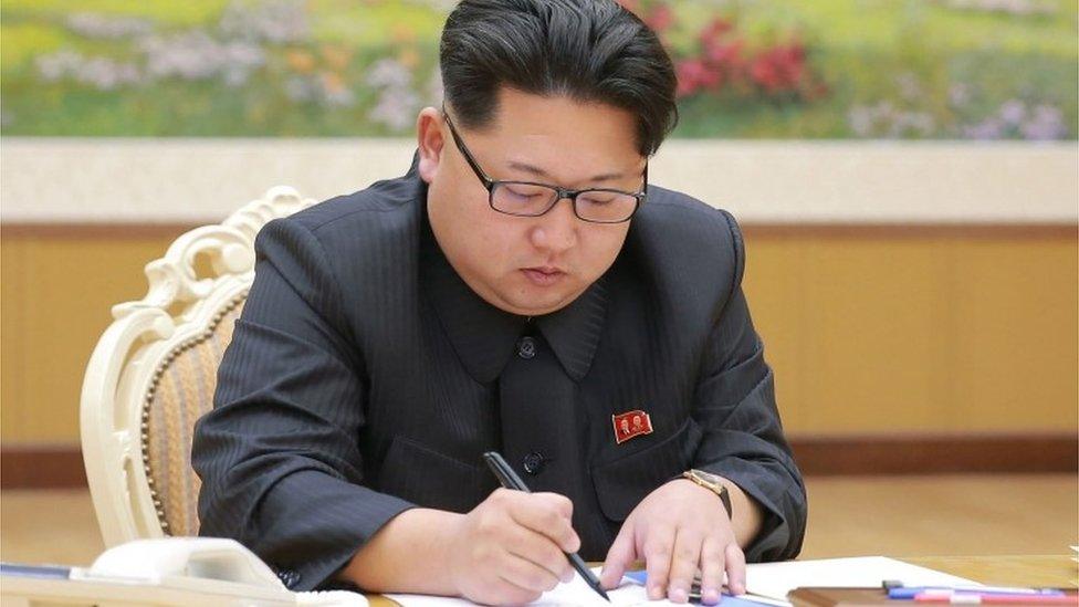 Kim Jong-un signing the order for the test