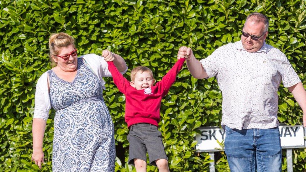 Alec Carpenter with parents Nicola and Glen