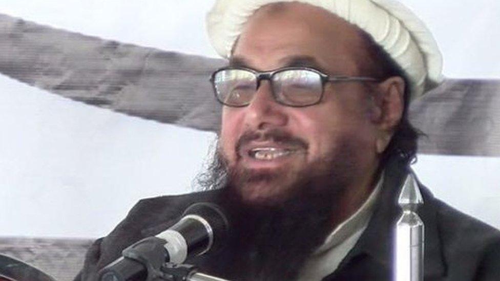 Hafiz Saeed (right) addresses activists in Muzaffarabad 11 January