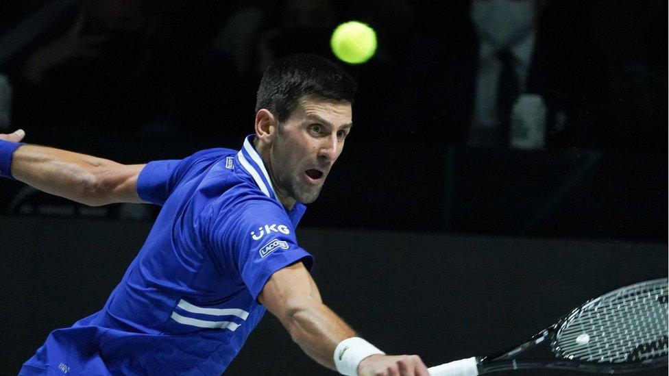 novak djokovic playing tennis