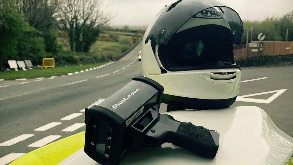 Police helmet and speed gun