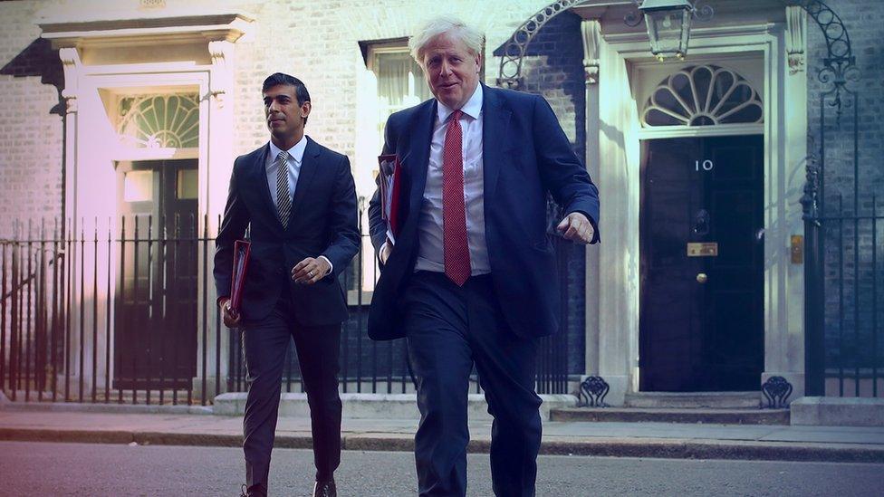 Boris Johnson and Rishi Sunak walking together in Downing Street