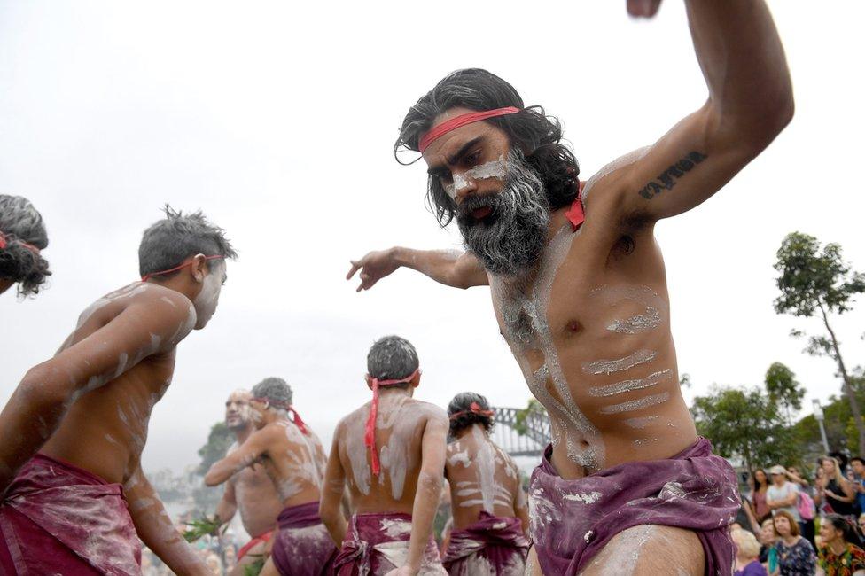 Koomurri people and representatives of aboriginal groups from around Australia perform the Smoking Ceremony and Dance during the WugulOra Morning Ceremony at Walumil Lawn at Barangaroo Reserve as part of Australia Day celebrations in Sydney, Australia, 26 January 2017