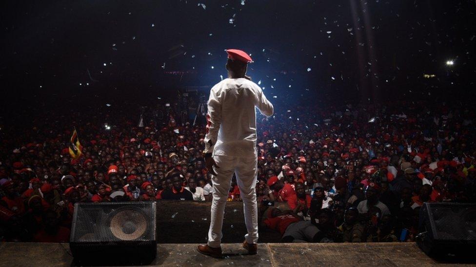 Bobi Wine appears on stage on the outskirts of Kampala