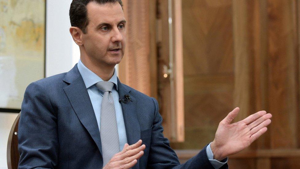 Syria's President Bashar al-Assad speaks during an interview with Yahoo News (10 February 2017)