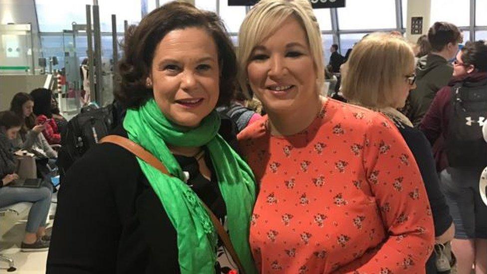 Michelle O'Neill and Mary Lou McDonald in an airport