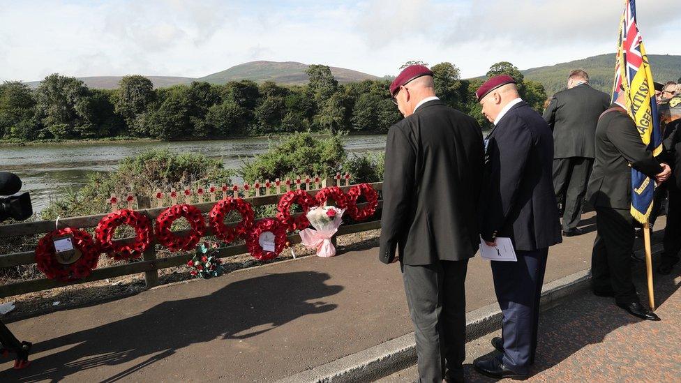 Veterans gathered at the roadside at Narrow Water