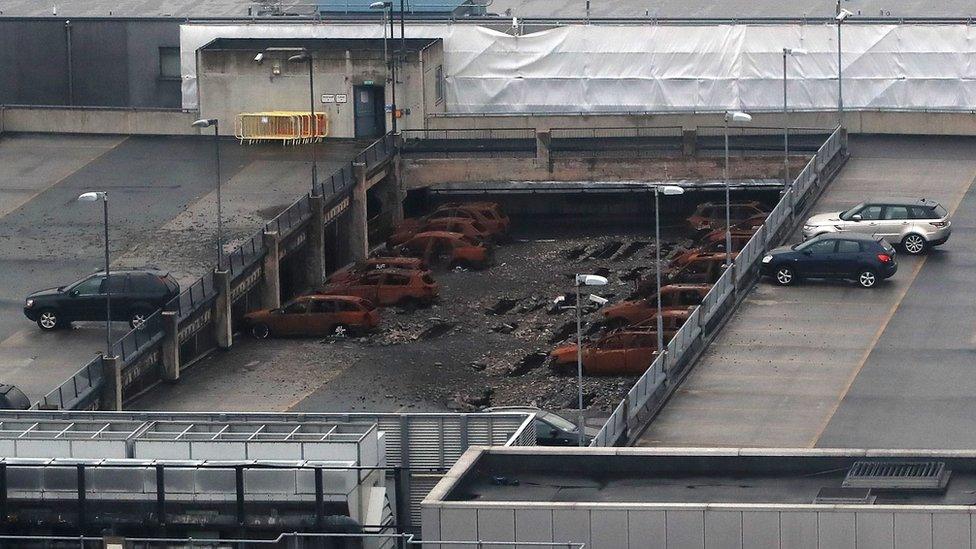 Cars in a fire-damaged Liverpool car park