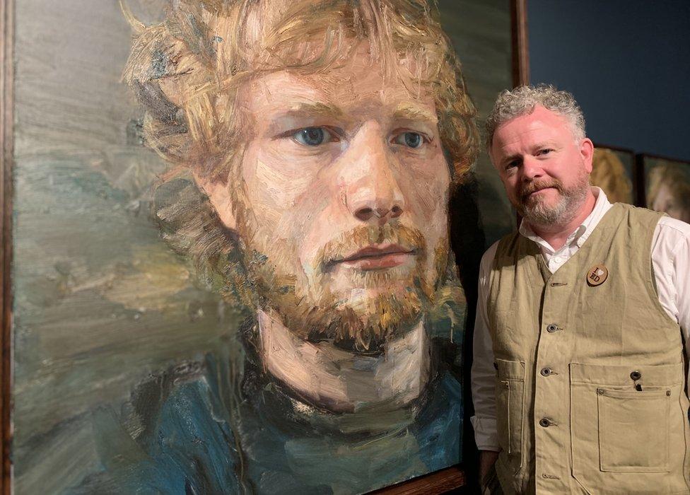 Colin Davidson with his painting of Ed Sheeran