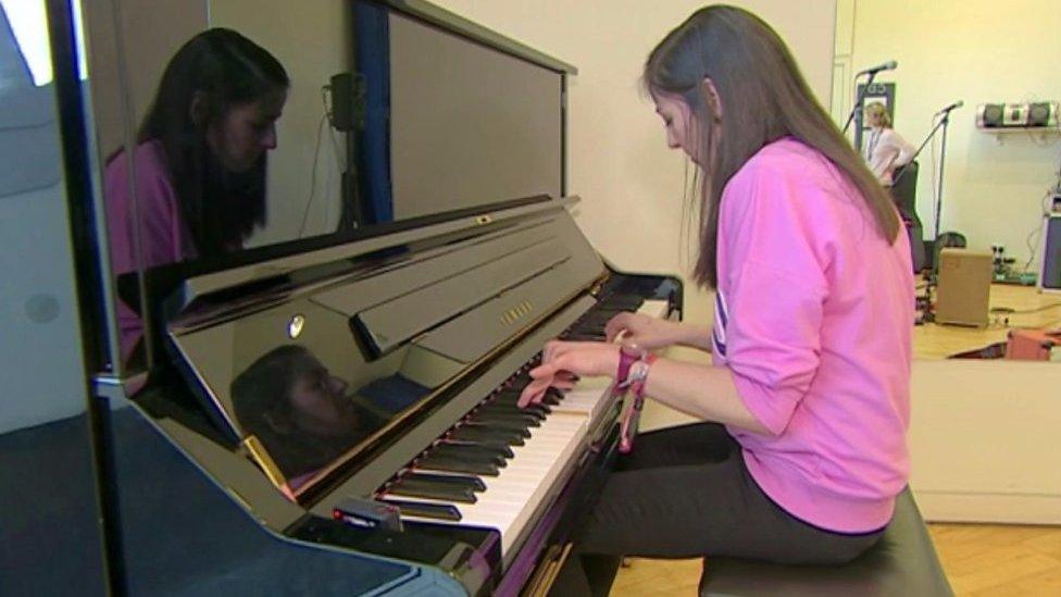 Sarah at the piano