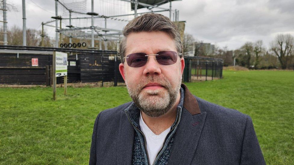 Councillor Kieran Morgan-McGeehan, standing in front of the high ropes attraction