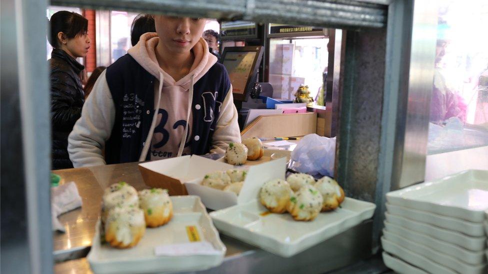 Customer stares at dumplings