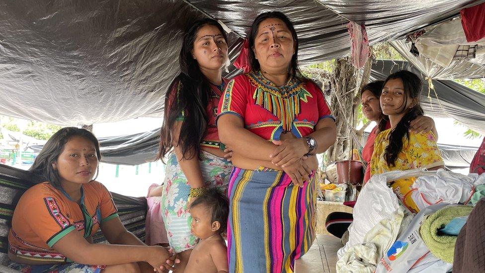 Margarita Pernia poses for a photo with her three daughters