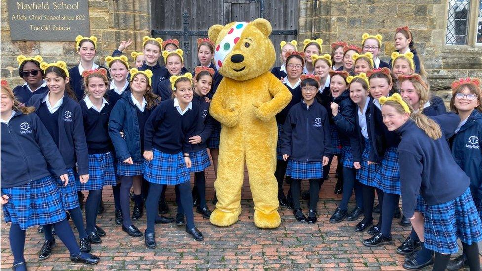 Pudsey bear with schoolchildren at Mayfield School, East Sussex